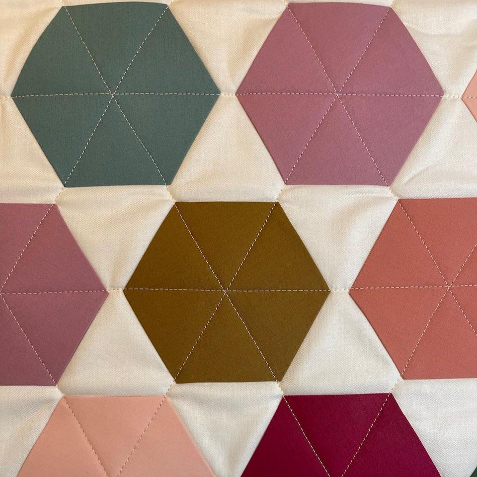 A close up of the Bright Star Wall Hanging showing the hexagons.