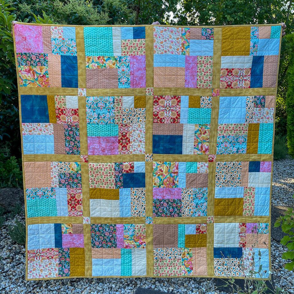 Fat Quarter Quilt shown in full in the garden