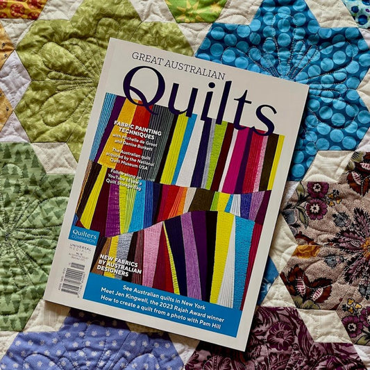 Great Australian Quilts Magazine laying on the Little Blooms Quilt