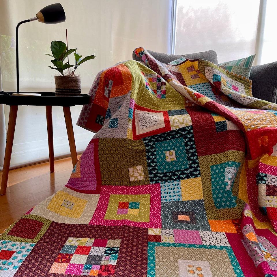 The Squared Quilt draped over a chair